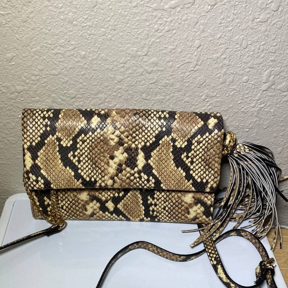 Also animal print bag clutch
